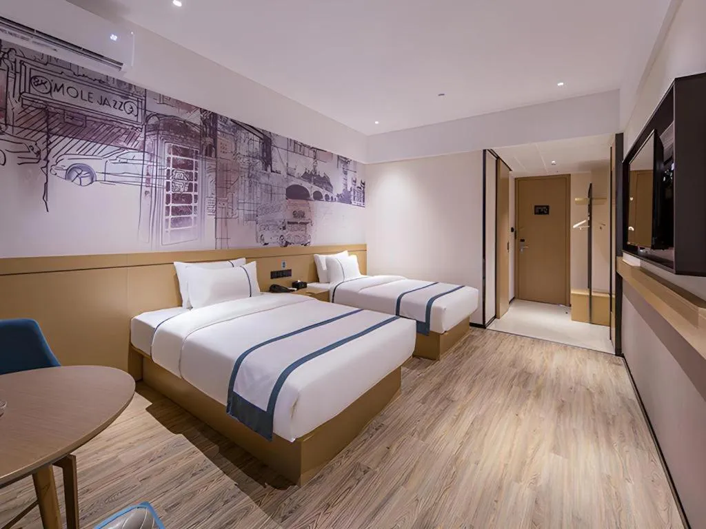Bed in City Comfort Inn Liuzhou Liudong New District Hualing Youlinghui