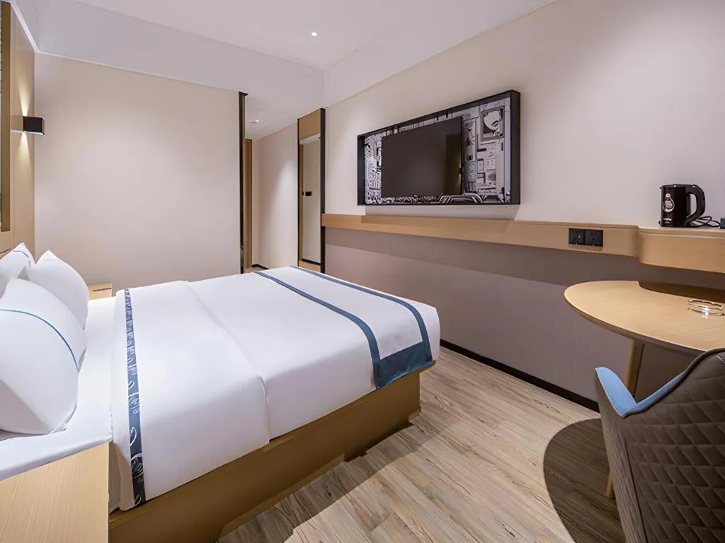 Bed in City Comfort Inn Liuzhou Liudong New District Hualing Youlinghui