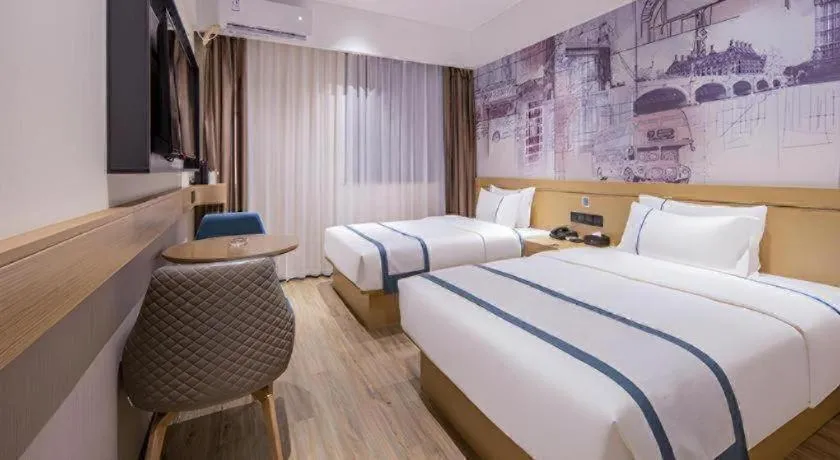Bed in City Comfort Inn Liuzhou Liudong New District Hualing Youlinghui