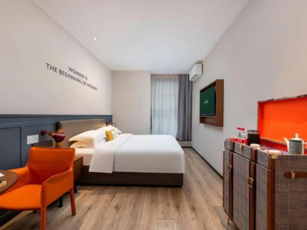 Bed in City Comfort Premier Hotel Liuzhou Wuxing Pedestrian Street Jinggu Building