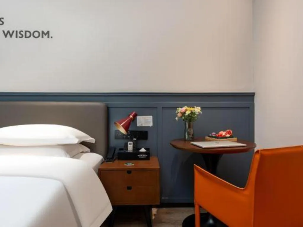 Bed in City Comfort Premier Hotel Liuzhou Wuxing Pedestrian Street Jinggu Building