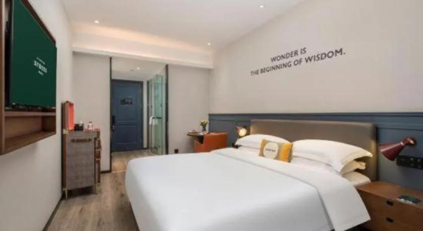 Bed in City Comfort Premier Hotel Liuzhou Wuxing Pedestrian Street Jinggu Building