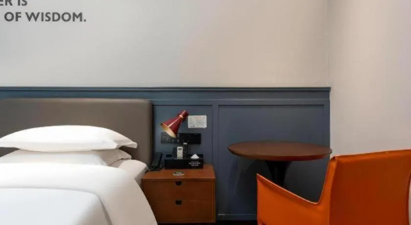 Bed in City Comfort Premier Hotel Liuzhou Wuxing Pedestrian Street Jinggu Building