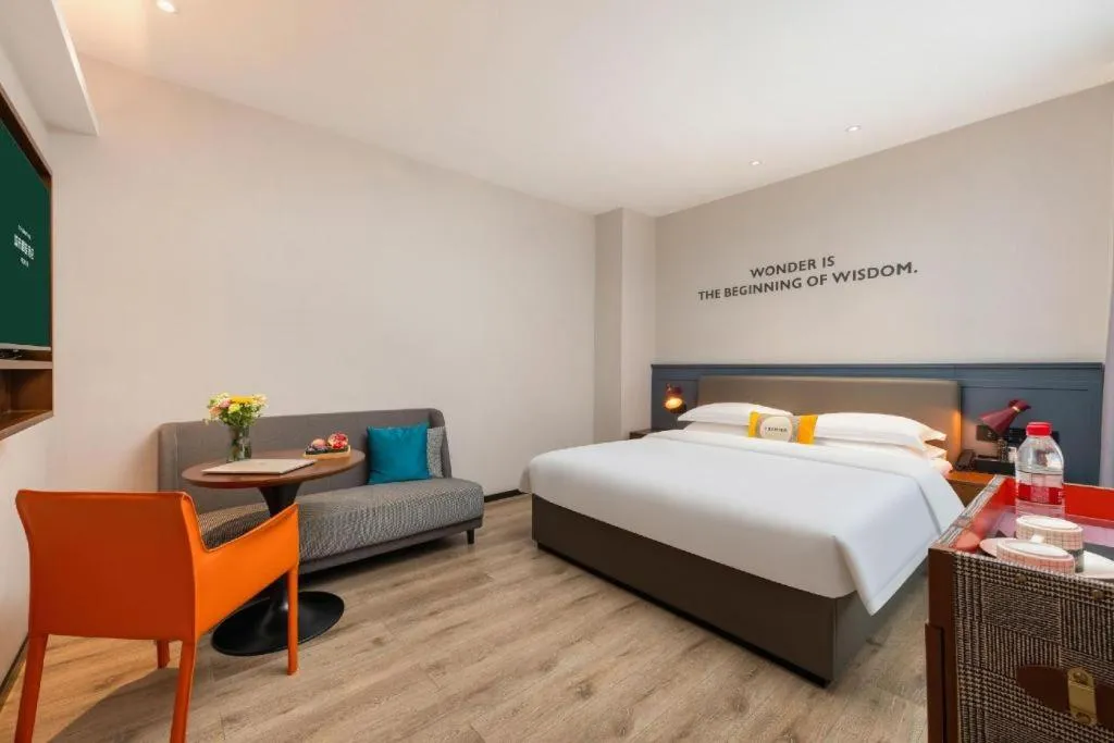 Bed in City Comfort Premier Hotel Liuzhou Wuxing Pedestrian Street Jinggu Building