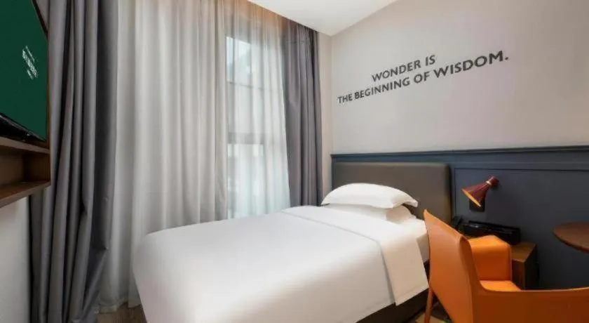 Bed in City Comfort Premier Hotel Liuzhou Wuxing Pedestrian Street Jinggu Building
