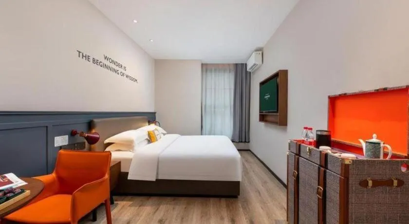 Bed in City Comfort Premier Hotel Liuzhou Wuxing Pedestrian Street Jinggu Building