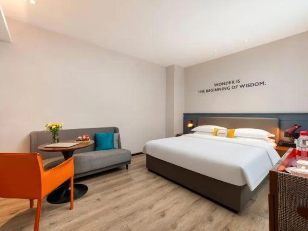 Bed in City Comfort Premier Hotel Liuzhou Wuxing Pedestrian Street Jinggu Building