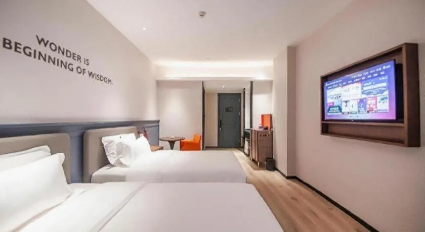 Bed in City Comfort Premier Hotel Liuzhou Wuxing Pedestrian Street Jinggu Building