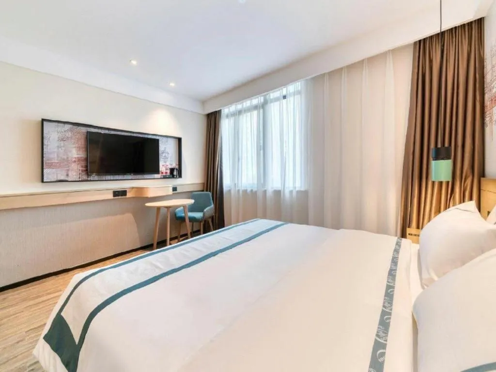 Bed in City Comfort Inn Yancheng Xihuan Road Wanda Plaza