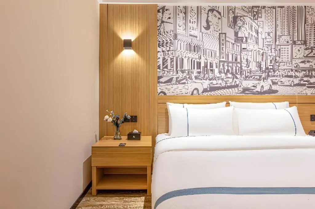 Bed in City Comfort Inn Yancheng Xihuan Road Wanda Plaza