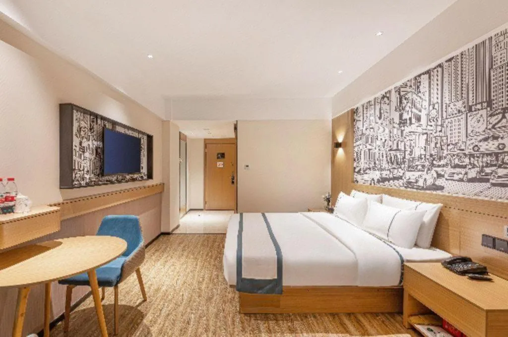 Bed in City Comfort Inn Yancheng Xihuan Road Wanda Plaza