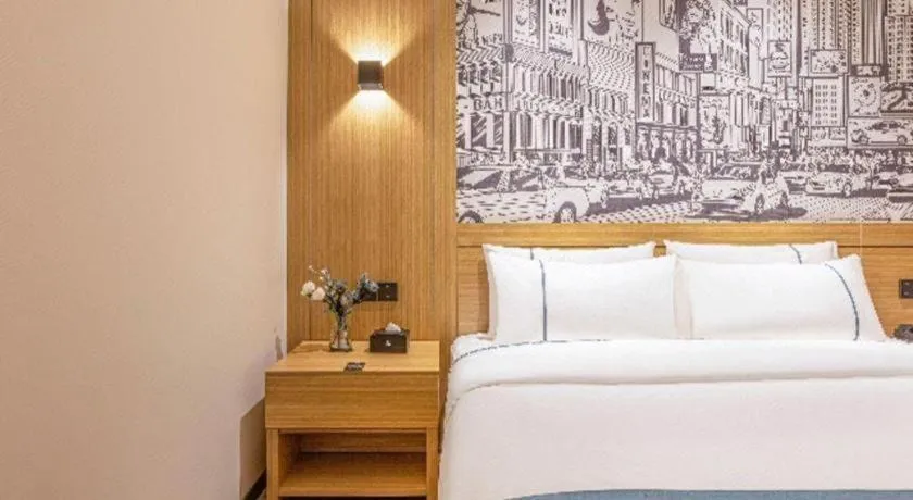 Bed in City Comfort Inn Yancheng Xihuan Road Wanda Plaza