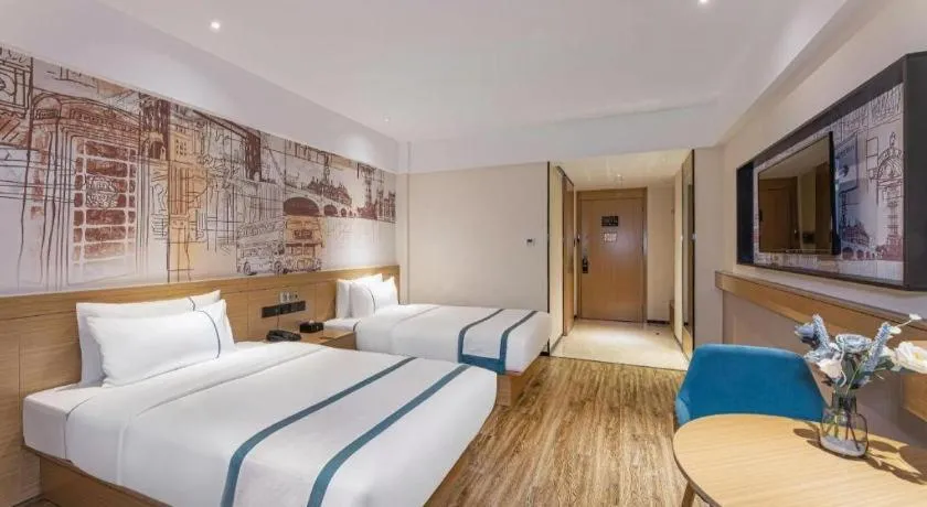 Bed in City Comfort Inn Yancheng Xihuan Road Wanda Plaza