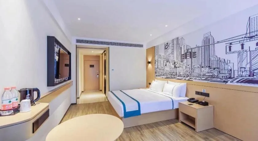 Bed in City Comfort Inn Yancheng Xihuan Road Wanda Plaza