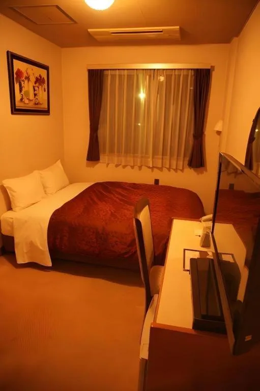 Bed in Hotel Miyoshino Annex