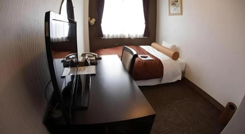 Bed in Hotel Miyoshino Annex