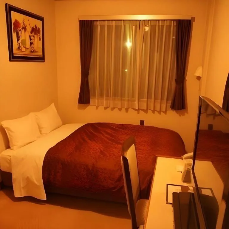 Bed in Hotel Miyoshino Annex