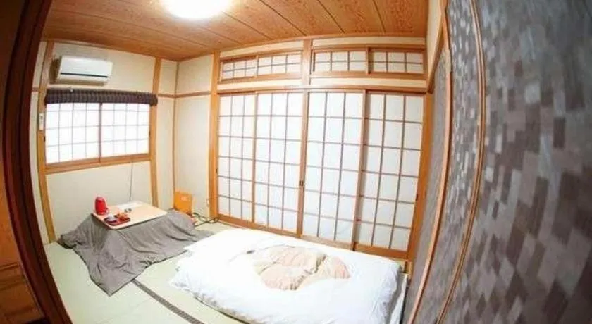 Bed in Hotel Miyoshino Annex