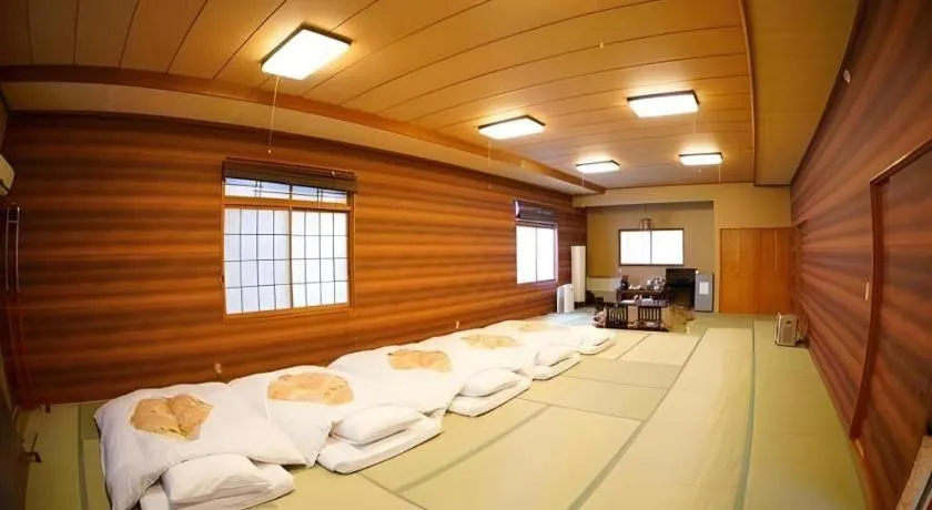 Bed in Hotel Miyoshino Annex