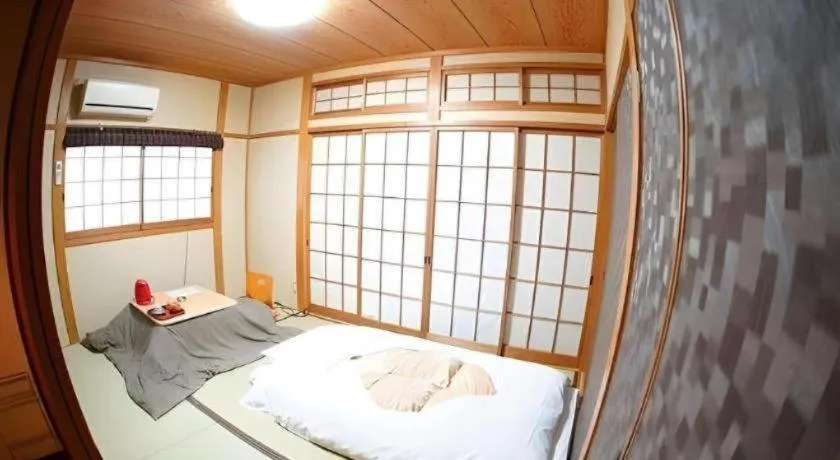 Bed in Hotel Miyoshino Annex