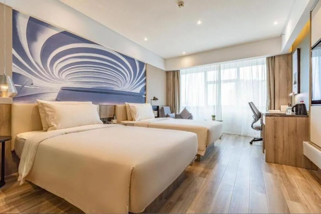 Bed in Atour Hotel Changsha Wuyi Square Wanbao Avenue