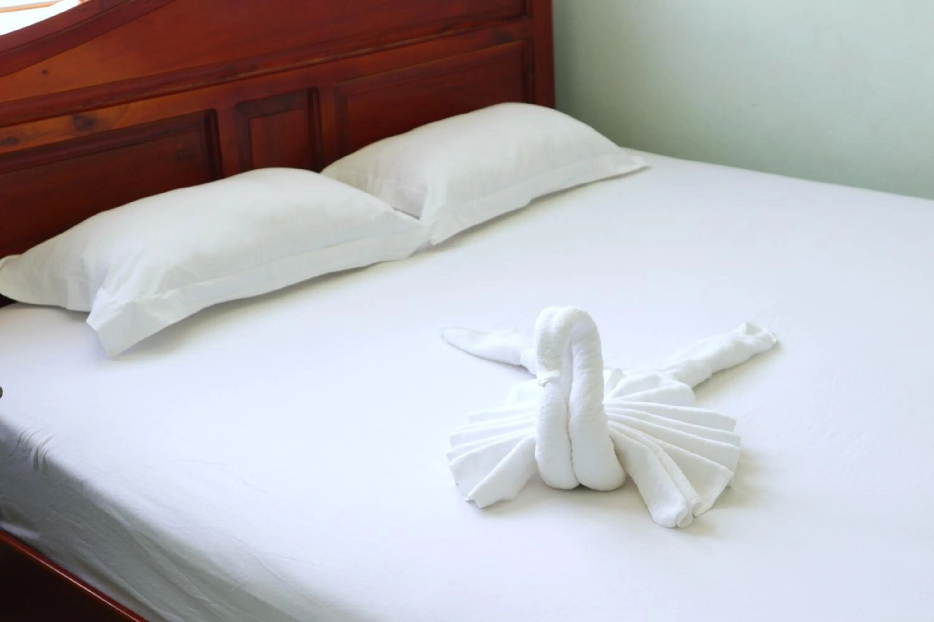 Bed in Quoc Dinh Guest House