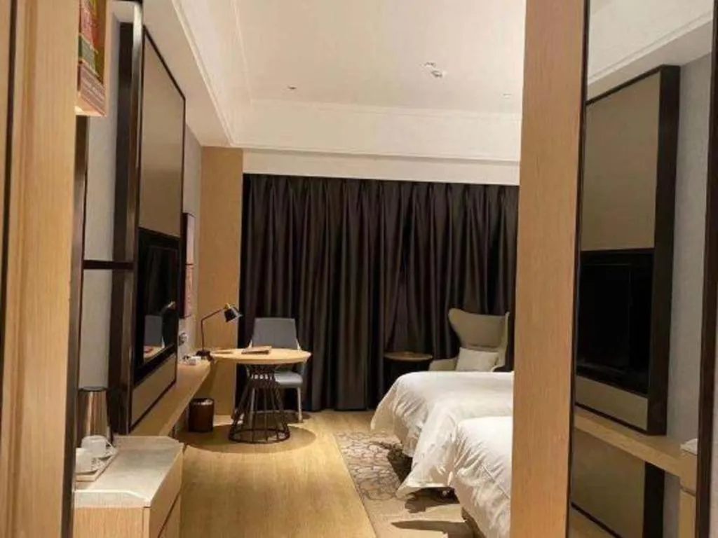 Bed in Venus Royal Hotel Anhui Tongcheng Tongguoxiushui