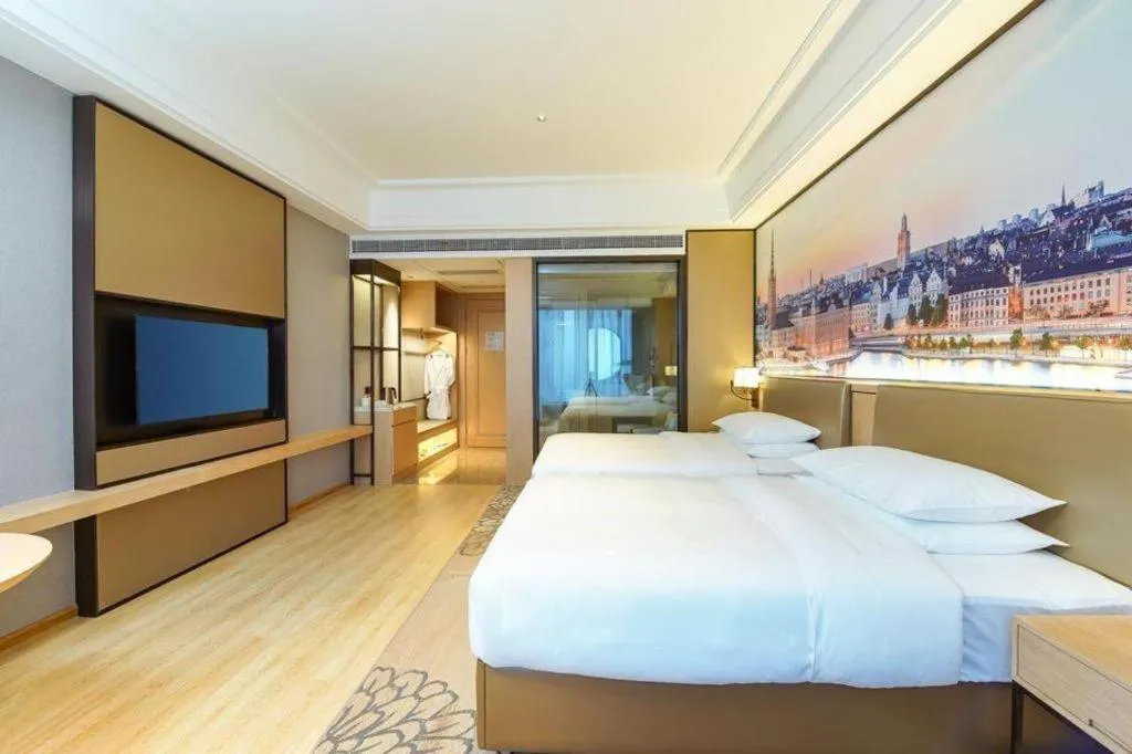 Bed in Venus Royal Hotel Anhui Tongcheng Tongguoxiushui