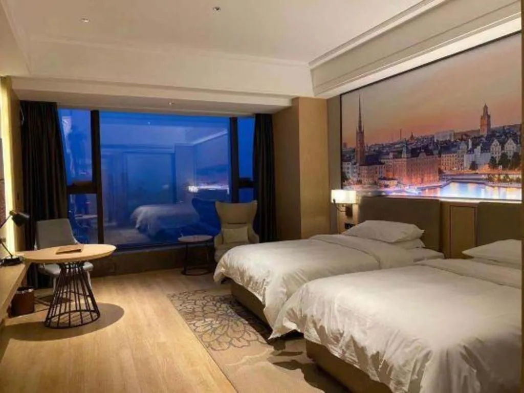 Bed in Venus Royal Hotel Anhui Tongcheng Tongguoxiushui