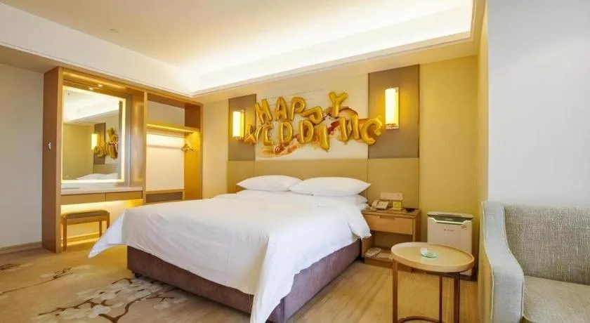 Bed in Vienna Hotel Zhengzhou East High-Speed Railway Station