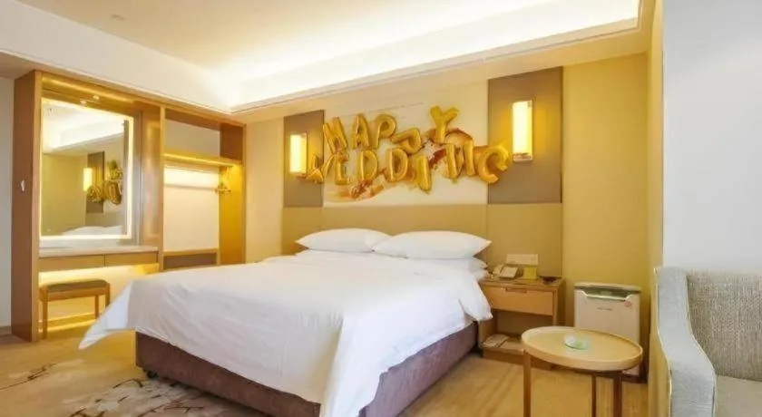 Bed in Vienna Hotel Zhengzhou East High-Speed Railway Station