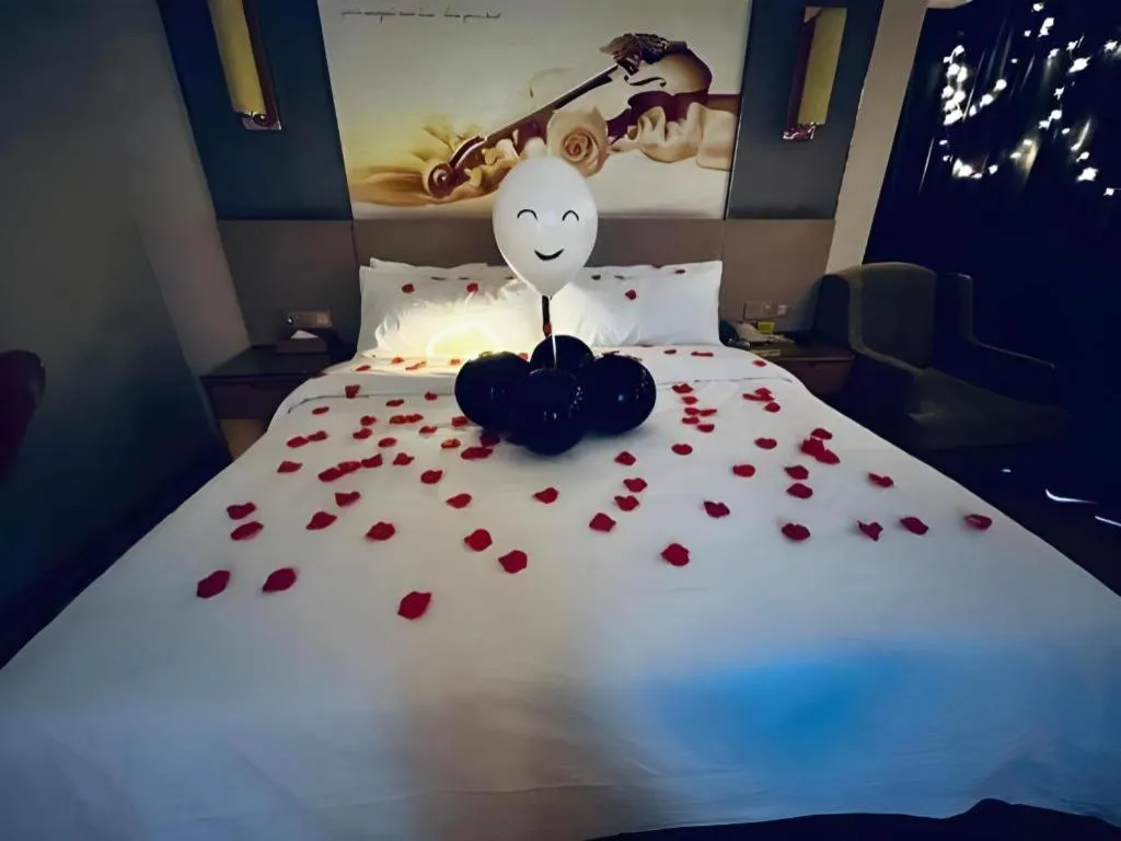 Bed in Vienna Hotel Zhengzhou East High-Speed Railway Station