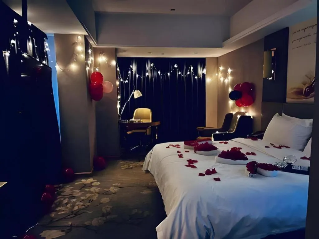 Bed in Vienna Hotel Zhengzhou East High-Speed Railway Station