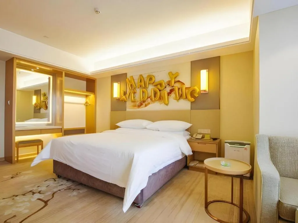 Bed in Vienna Hotel Zhengzhou East High-Speed Railway Station