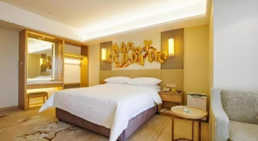 Bed in Vienna Hotel Zhengzhou East High-Speed Railway Station