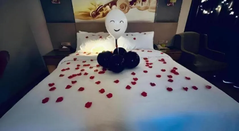 Bed in Vienna Hotel Zhengzhou East High-Speed Railway Station