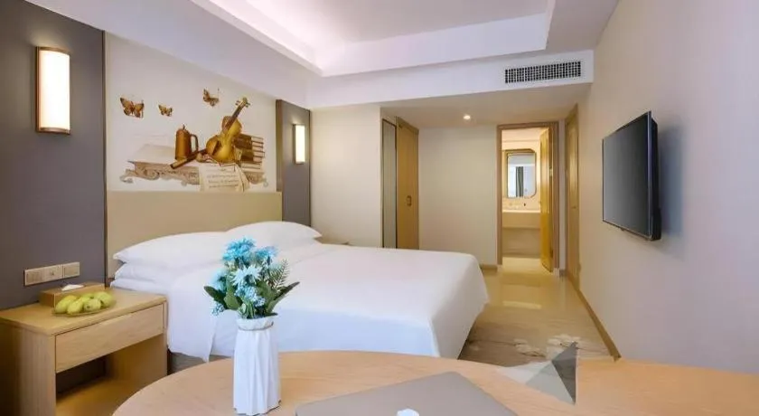 Bed in Vienna Hotel Zhengzhou East High-Speed Railway Station