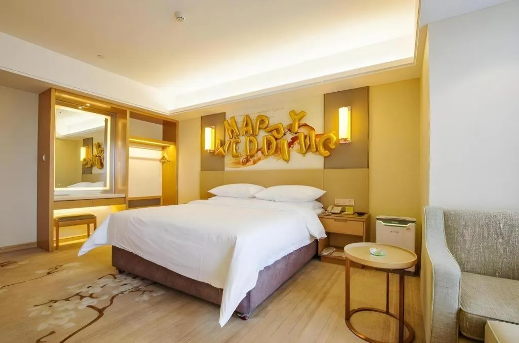 Bed in Vienna Hotel Zhengzhou East High-Speed Railway Station