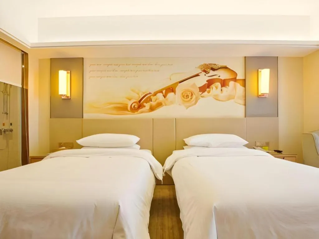 Bed in Vienna Hotel Zhengzhou East High-Speed Railway Station