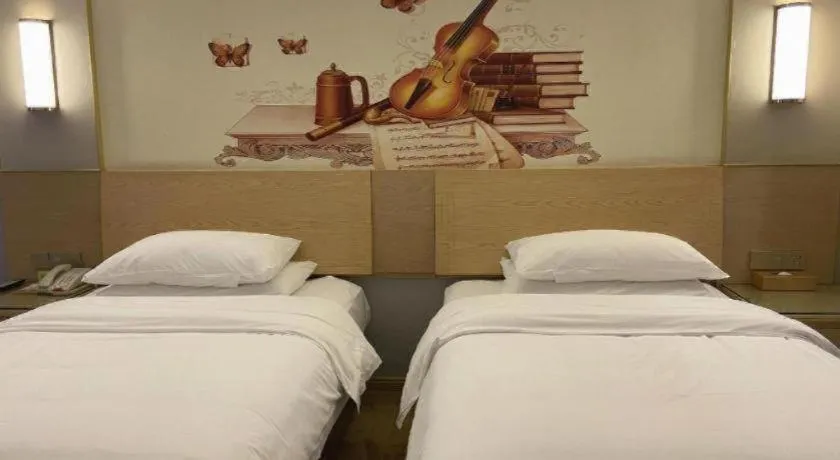 Bed in Vienna Hotel Yueyang East Station