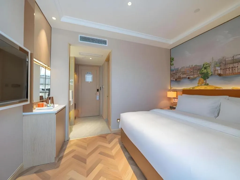 Bed in Vienna Hotel Chongqing West Station Square