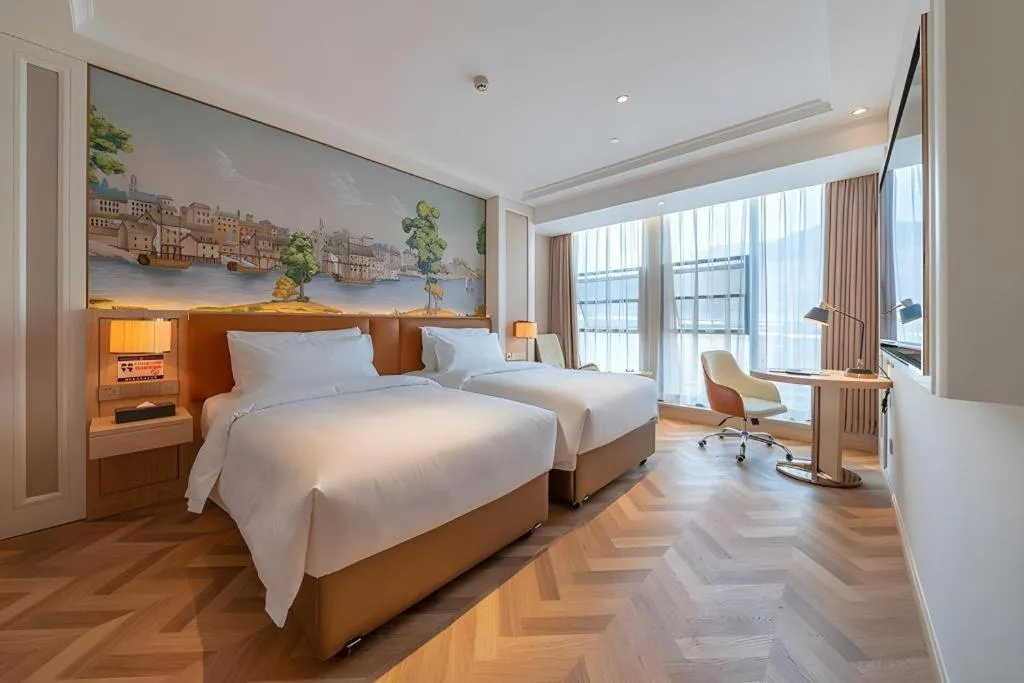 Bed in Vienna Hotel Chongqing West Station Square