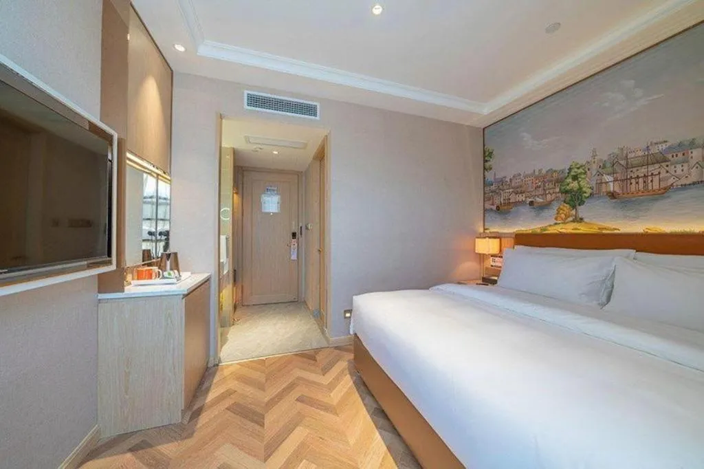 Bed in Vienna Hotel Chongqing West Station Square