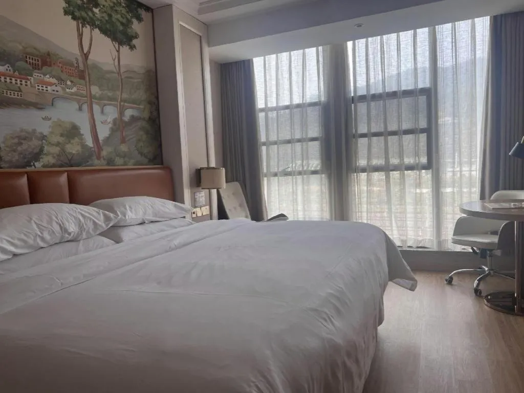 Bed in Vienna Hotel Chongqing West Station Square