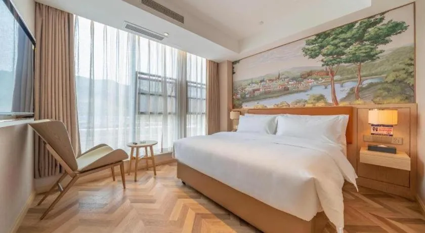 Bed in Vienna Hotel Chongqing West Station Square