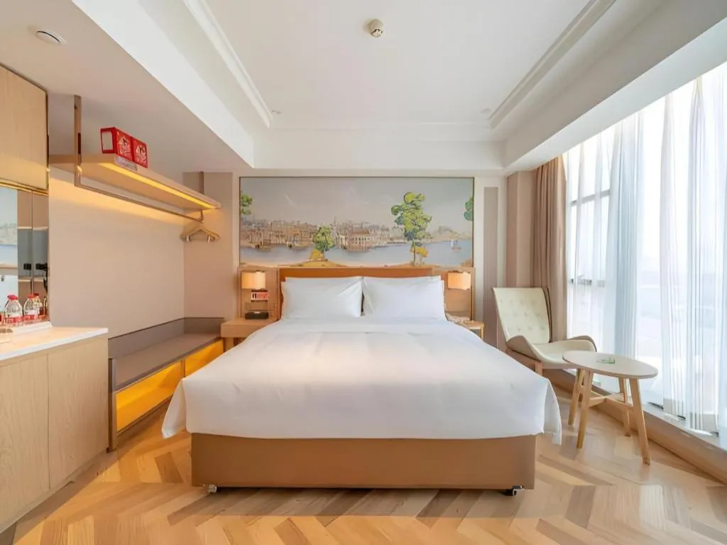 Bed in Vienna Hotel Chongqing West Station Square