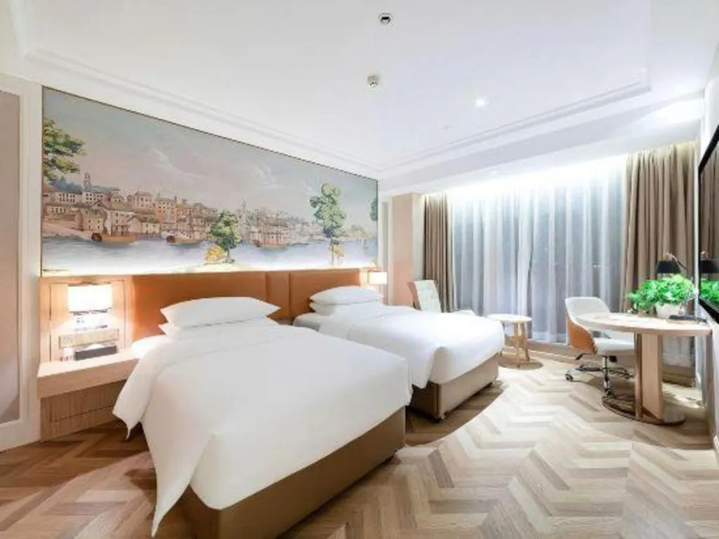 Bed in Vienna Hotel Chongqing West Station Square