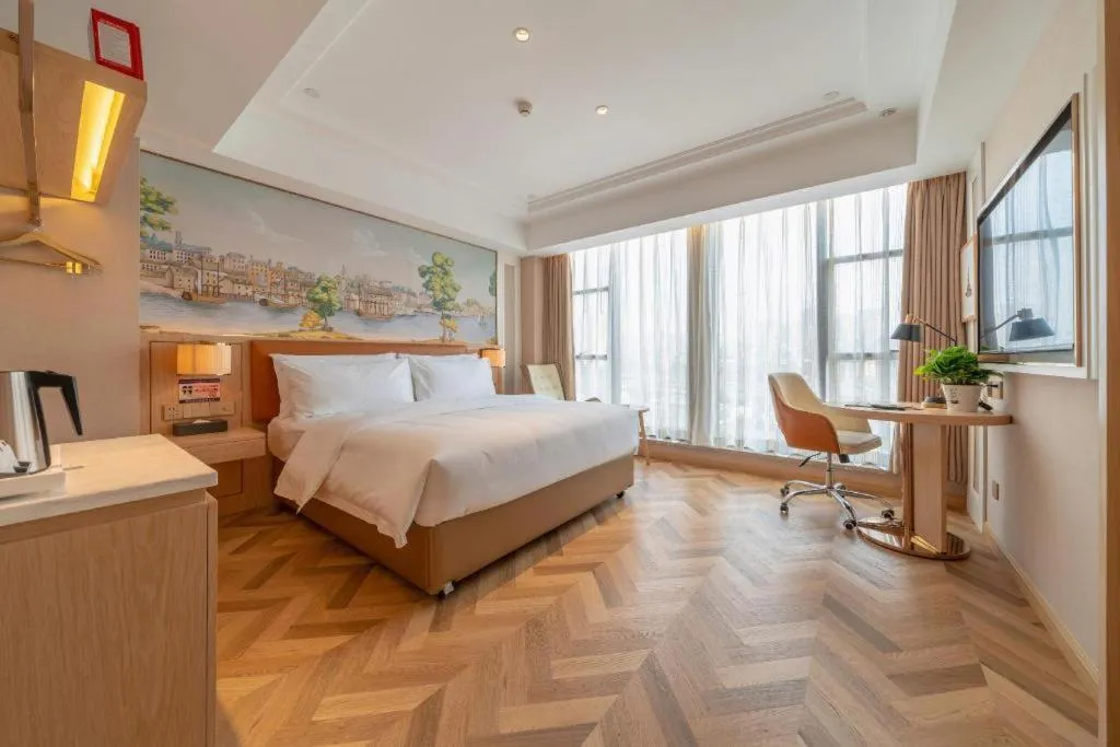 Bed in Vienna Hotel Chongqing West Station Square