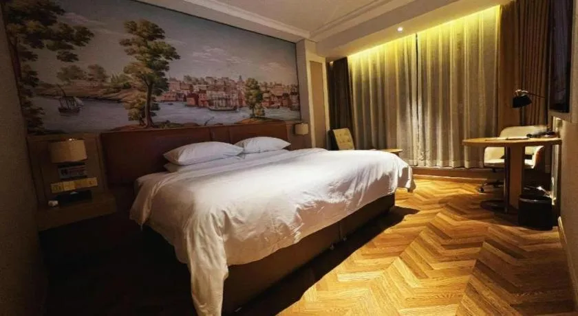 Bed in Vienna Hotel Chongqing West Station Square