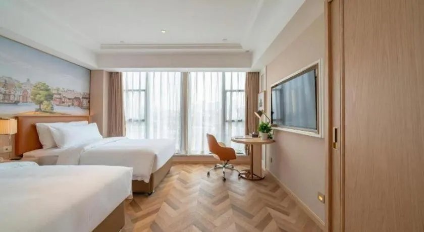 Bed in Vienna Hotel Chongqing West Station Square